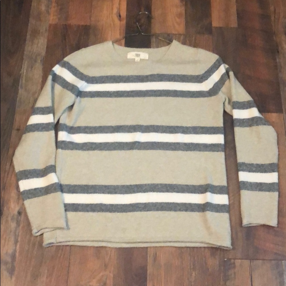 Blue and cream colored striped sweater